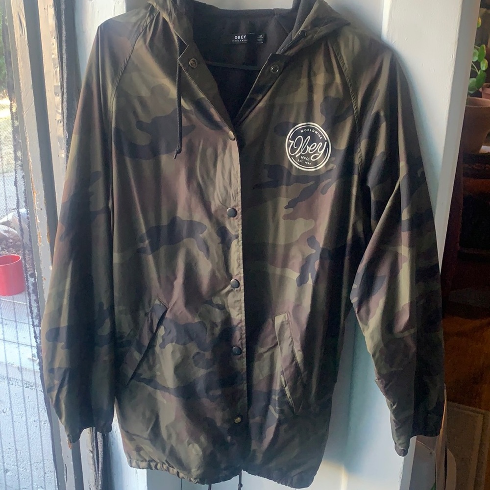 Fleece lined Obey wind breaker, bottom drawstrings